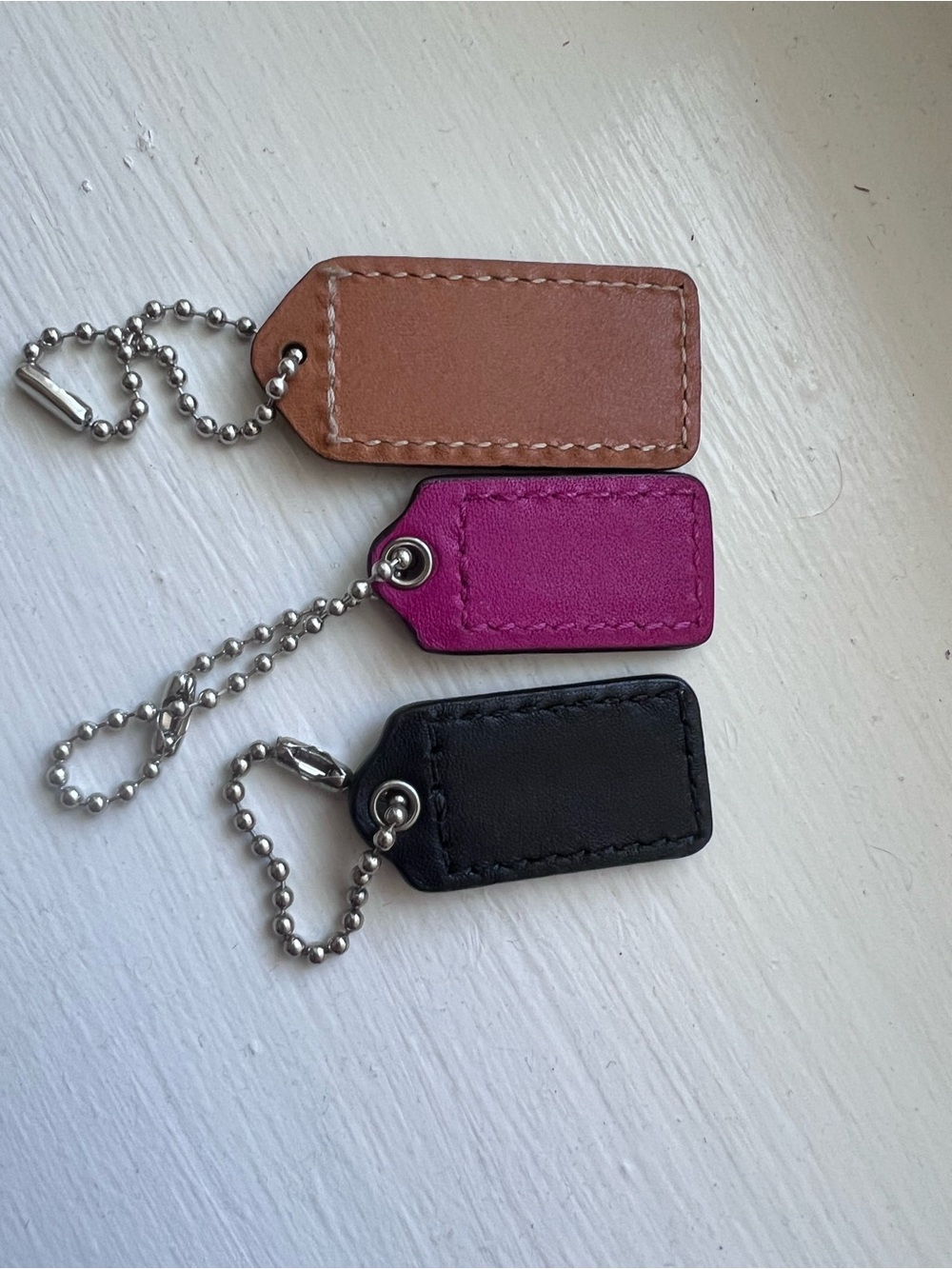 Coach Hangtag Set Of 3 In Brown, Magenta, and Black